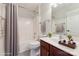 Bathroom with a tub and shower combination, single vanity, and neutral colors at 12727 Bullock Greenway Blvd, Charlotte, NC 28277