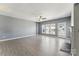 Spacious living room with neutral paint, a fireplace, and modern flooring at 12727 Bullock Greenway Blvd, Charlotte, NC 28277