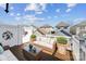 Comfortable outdoor seating area on a patio with views of neighboring houses at 12727 Bullock Greenway Blvd, Charlotte, NC 28277