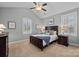 Bedroom featuring carpeted floors and large windows with natural light at 16620 Redding Park Ln, Cornelius, NC 28031