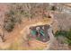 Aerial view of the neighborhood playground with slides and climbing structures at 16620 Redding Park Ln, Cornelius, NC 28031