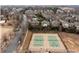 Aerial view of neighborhood tennis courts for recreational activity at 16620 Redding Park Ln, Cornelius, NC 28031