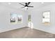 Light-filled bedroom with large windows providing lots of natural light and neighborhood views at 1817 S Mint St, Charlotte, NC 28203