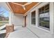 Inviting front porch with a wood ceiling, brick pillars, and ample natural light at 1817 S Mint St, Charlotte, NC 28203