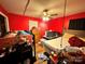 Bedroom featuring a red wall, wood floors, and standard closet at 2027 Downey St, Rock Hill, SC 29732