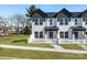 Charming townhouse with a white picket fence and manicured front lawn at 219 E Rice St, Landis, NC 28088