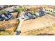 Spacious home with a long driveway and fenced backyard in a quiet neighborhood, seen from an aerial perspective at 2605 Lakefront Dr, Belmont, NC 28012