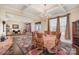 A bright dining area opens up to living spaces featuring hardwood floors at 2605 Lakefront Dr, Belmont, NC 28012