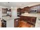 Kitchen boasts stainless steel appliances and granite countertops with an island at 2605 Lakefront Dr, Belmont, NC 28012