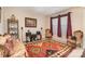 Sitting room with a patterned rug, neutral walls, and cozy seating arrangements at 2605 Lakefront Dr, Belmont, NC 28012