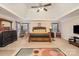 Large main bedroom features a tray ceiling, carpet, and neutral walls at 2605 Lakefront Dr, Belmont, NC 28012