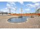 Backyard pool with stone waterfall features and ample lounging space at 2605 Lakefront Dr, Belmont, NC 28012