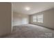 Bright bedroom with neutral carpet and plenty of natural light at 2647 Dusty Trail Ln, Lancaster, SC 29720