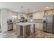 Modern kitchen with stainless appliances, white cabinets, and center island at 2647 Dusty Trail Ln, Lancaster, SC 29720