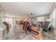 Open-concept living room showcasing modern flooring and seamless transition to the kitchen at 2647 Dusty Trail Ln, Lancaster, SC 29720