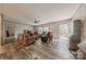 Comfortable living room with modern flooring, neutral colors, and back porch access at 2647 Dusty Trail Ln, Lancaster, SC 29720