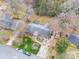 Aerial view of property featuring front yard, driveway, landscaping, and roof at 3021 Whitson Rd, Gastonia, NC 28054