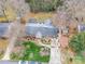 Aerial view of property featuring front yard, driveway, landscaping, and roof at 3021 Whitson Rd, Gastonia, NC 28054