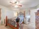 Comfortable bedroom with a wooden-framed bed and natural light coming through the window at 3021 Whitson Rd, Gastonia, NC 28054