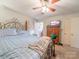 Cozy bedroom with hardwood floors, a wooden bed frame, and natural light from the window at 3021 Whitson Rd, Gastonia, NC 28054