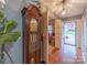 Foyer with beautiful hardwood floors, vintage grandfather clock, and closet at 3021 Whitson Rd, Gastonia, NC 28054