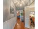 Hallway with hardwood floors leading to the living room at 3021 Whitson Rd, Gastonia, NC 28054