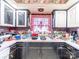 Functional kitchen space with range, tile counters, and cabinets at 3021 Whitson Rd, Gastonia, NC 28054