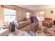 Bright living room with windows, furniture, and interesting rug at 3021 Whitson Rd, Gastonia, NC 28054