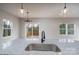 Modern kitchen island with granite countertops and stylish pendant lighting at 320 Cabarrus W Ave, Concord, NC 28025