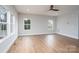 Spacious living room with hardwood floors, recessed lighting, and multiple windows at 320 Cabarrus W Ave, Concord, NC 28025