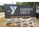 A Harris YMCA sign provides information for the Cato Education Center at 3224 Heathstead Pl, Charlotte, NC 28210