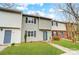 Charming townhome with gray siding, black shutters, and a well-manicured front lawn at 3224 Heathstead Pl, Charlotte, NC 28210