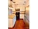 View of kitchen featuring an island, white cabinets, and stainless steel appliances at 3580 5Th Ne St, Hickory, NC 28601