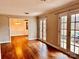 Elegant living room with hardwood floors, offering a seamless transition into the dining area at 3580 5Th Ne St, Hickory, NC 28601