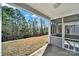 View of the spacious backyard from the screened-in patio at 41062 Calla Lily St, Fort Mill, SC 29707