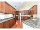 Well-equipped kitchen featuring stainless steel appliances and granite countertops at 4709 Polo Gate Blvd, Charlotte, NC 28216