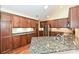 Kitchen with stainless steel appliances, granite countertops, and hardwood floors at 4709 Polo Gate Blvd, Charlotte, NC 28216