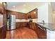 Kitchen with stainless steel appliances, ample cabinet space, and granite countertops at 4709 Polo Gate Blvd, Charlotte, NC 28216