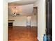 A bright living room with hardwood floors and a cozy fireplace, as viewed from the front entrance at 4709 Polo Gate Blvd, Charlotte, NC 28216