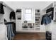 Organized walk-in closet featuring shelving, drawers, and hanging rods for optimal storage at 5608 Closeburn Rd, Charlotte, NC 28210