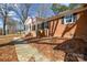 Charming brick home with white trim and an inviting front walkway at 571 Amity Se Ave, Concord, NC 28025