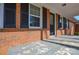 Close-up of a well-kept front porch with black shutters at 571 Amity Se Ave, Concord, NC 28025