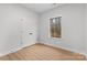 Well-lit bedroom with window and ample closet space at 607 W Stanly St, Stanfield, NC 28163