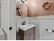 Charming bathroom with modern fixtures, neutral paint, and decorative oval mirror at 6126 Netherwood Dr, Charlotte, NC 28210