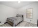 Simple bedroom design with a bed, clean white walls, and window creating a serene atmosphere at 620 Debruhl Rd, Chester, SC 29706