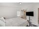 Bright main bedroom with a view into en-suite bathroom and a rustic sliding barn door at 620 Debruhl Rd, Chester, SC 29706