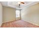 Bedroom with neutral carpet, a tray ceiling, and natural light at 631 Winding Branch Rd, Rock Hill, SC 29732