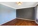 Cozy living room featuring hardwood floors and neutral wall colors at 631 Winding Branch Rd, Rock Hill, SC 29732