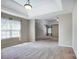 Spacious carpeted main bedroom featuring a trey ceiling and natural light at 631 Winding Branch Rd, Rock Hill, SC 29732