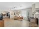 Cozy living room featuring a fireplace, neutral decor, and comfortable seating at 710 Peranna Pl, Charlotte, NC 28211